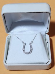 10 Karat White Gold Chain With 10 Karat Gold And Diamond Horse Shoe Pendant