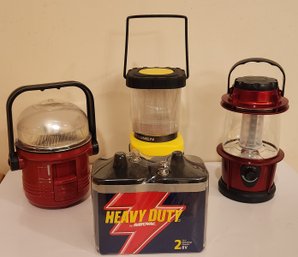 Three Battery Powered Lanterns And A New Dual Pack Of Batteries