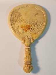 Ornate Celluloid Beveled Glass Hand Mirror