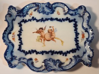 Victoria Austria Flow Blue Porcelain Dresser Tray With Scene Of Cherubs Llaying Instruments