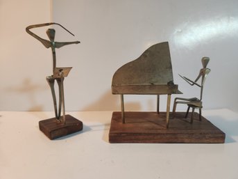 Metal Pianist And Conductor Sculptures