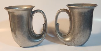 Two Cast Aluminum Horn Form Beer Mugs