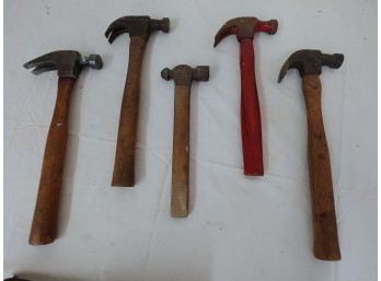 Four Good Quality Claw Hammers And A Small Ball Peen Hammer