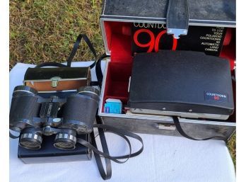 Vintage Binoculars And Polaroid Land Camera