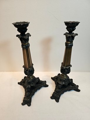 Cast Iron And Brass Candlesticks