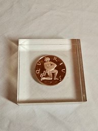 Aquarius 1 Ounce Silver Round Set In Lucite