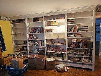 Wall Of And Boxes Of Books Must Take All