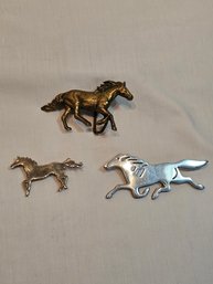 2 Horse Pins And A Horse Belt Buckle