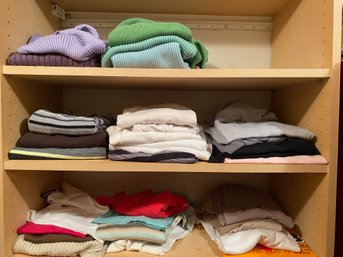 3 Shelves Of Sweaters