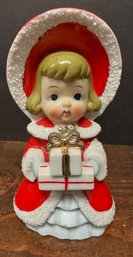 Vintage Christmas Figurine Holding Gifts