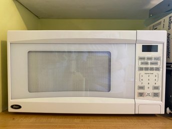 Oster 1.1 Cu Ft Microwave