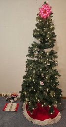 7' Lighted Christmas Tree With Some Ornaments And Other Decorations With Bows , Wrapping Paper  And Ribbon