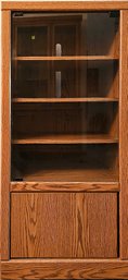 Oak Glass Front Media Center With 5 Shelves On Casters
