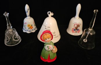 An Assortment Of Vintage Bells Incl. Red Ceramic Girl, Floral, 25th Anniversary, Friendship And More