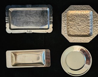 A Group Of Stainless Steel Trays W One Aluminum Tray