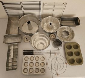 A Large Assortment Of Mostly Aluminum Baking Pans Incl. Bunt , Bread, Muffin, Cake, Cooling Racks And More