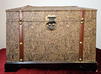 Wooden Storage Trunk With Embossed Leather And Metal Embellishments And Velvet Lining