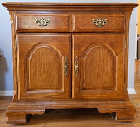 Oak Hutch With Fold Out Table Top & Brass Embellishments By Stanley Furniture