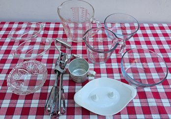 Lot Of Kitchen Items Incl 2 Glass Measuring Cups, Baked Potato Dish, Hand Crank Beater & More