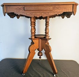 Antique Victorian Parlor Table On Casters