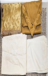 Cream Table Cloth With Matching Cloth Napkins And Gold Table Runner With Fringe