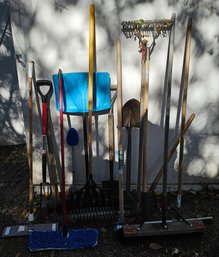 Large Assortment Of Tools Incl Metal Rakes, Shovels, Broom, Snow Shovel & More