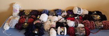 An Assortment Of Mostly Chenille Yarn In Multiple Brands