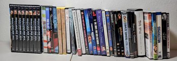 Assortment Of Dvds Incl Magnum PI, Aviation Action, Finding Nemo, Snow White & More