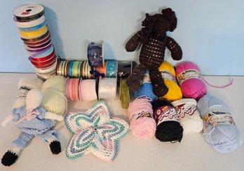 Ribbon, Yarn And 2 Crocheted Plush Dolls