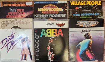 A Collection Of Vinyl Incl. Footloose, Dirty Dancing, Abba, Village People, Kenny Rogers And More