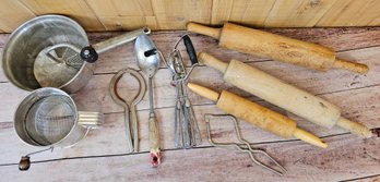 A Collection Of Vintage Rolling Pins, Seed Separator, Sifter, Jar Opener And More