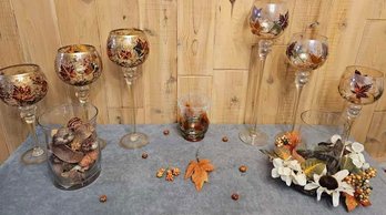 An Assortment Of Fall Decor Incl A Yankee Candle, A Floral Candle Holder And More