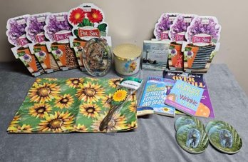 An Assortment Of Pot Sox, Sunflower Placemats, Books And More