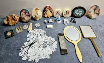 An Assortment Of Vintage Vanity Accessories Incl Bakelite Mirror, Bee Kay Creations Magnets W Stands  And More