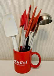 An Assortment Of Rubber Spatulas In Red Egg And I Coffee Mug