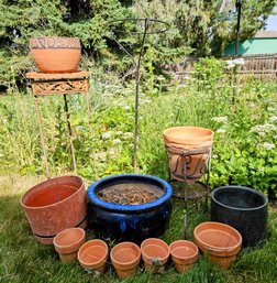 Gardening Pots And Plant Stands With One Great Blue Ceramic And Various Terra Cotta Pots