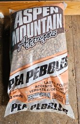 An Unopened Bag Of 1/2 CU. FT. Of Pea Pebbles Stone By Aspen Mountain