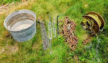 Chains, Rope, And A Large Aluminum Tub