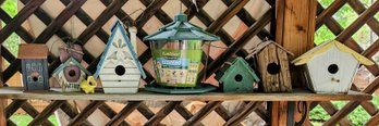 Assortment Of Bird Houses And Bird Feeders