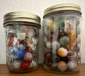 2 Jars Filled With Vintage Marbles
