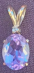 An Amethyst  And Diamond Pendant 10k Gold