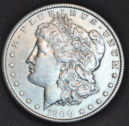 1900 Morgan Silver Dollar Great Date AU  SUPERB! Chest Feathering IN PLASTIC CASE (9opm6)