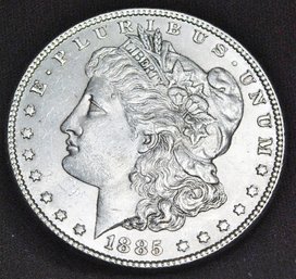 1885  Morgan Silver Dollar  AU / Uncirculated  FULL Chest Feathering  (arm31)