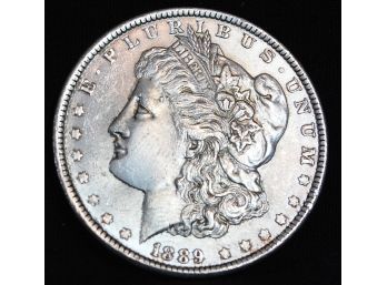 1889 Morgan Silver Dollar  XF / AU  FULL CHEST FEATHERING!  (grs73)