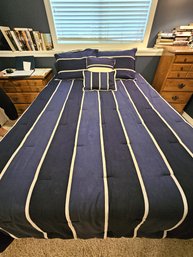 Queen Bed Frame With Navy Bedding And Bed Skirt- Sealy Mattress Available If You Want It