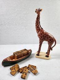 Wooden Canoe With Domino's And T Giraffe