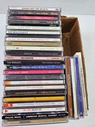 Box Of CDs -variety, Mamma Mia, Beach Boys, Big Band Etc