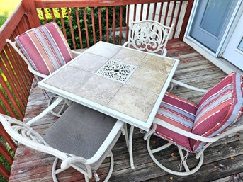 Patio Table With Four Chairs -Chairs Match But Cushions Don't, Three Swivel One May Need Some Work