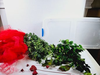 Under The Bed Tote W/greenery And A Bag Of Red Netting