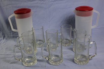 2 Plastic Pitchers And 8 Glass Mugs